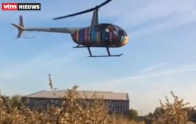 Helikopter beschermt bloesems tegen vorst